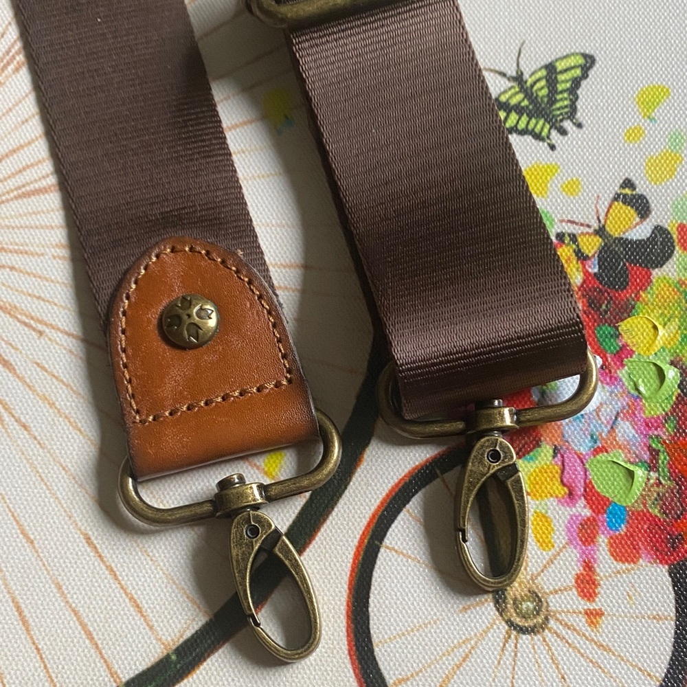 Patricia Nash Brown Webbing Strap with Tan Leather Accents.